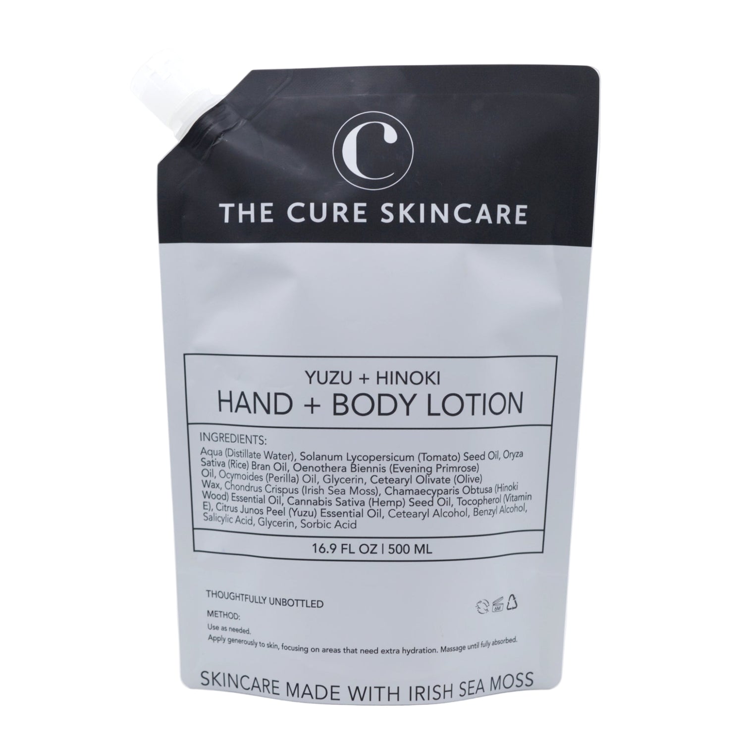 The Cure Skincare Yuzu + Hinoki Hand & Body Lotion packaging on a white background