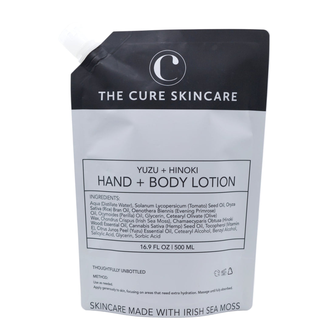 The Cure Skincare Yuzu + Hinoki Hand &amp; Body Lotion packaging on a white background