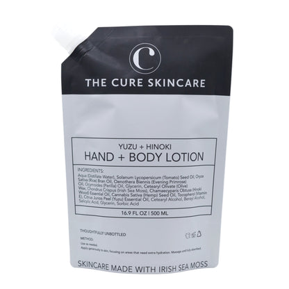 The Cure Skincare Yuzu + Hinoki Hand &amp; Body Lotion packaging on a white background