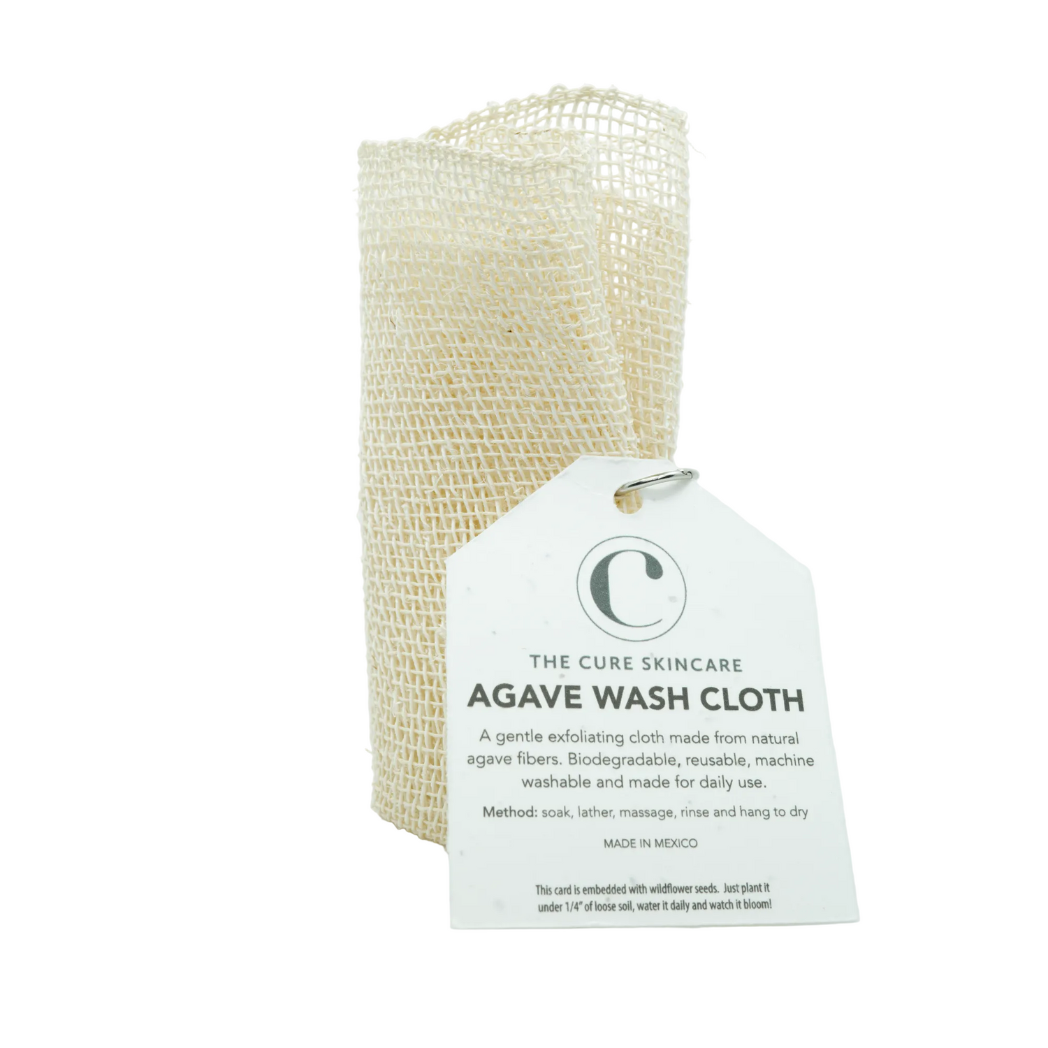 Agave wash cloth with packaging on a light gray background